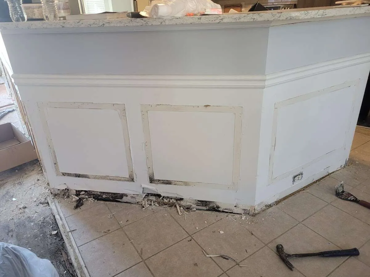 Water damage and mold on kitchen during Storm Damage Restoration in Harborcreek
